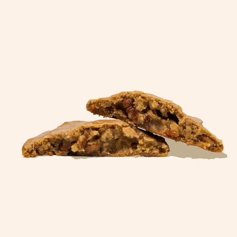 Cross section Maple Frosted Maple Pecan cookies on white background